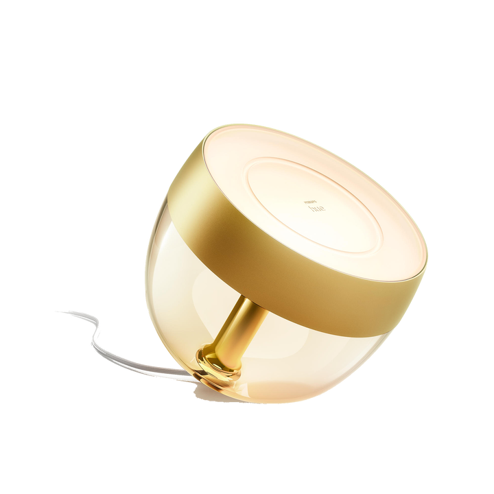 <p>L&aacute;mpara de Sobremesa HUE Iris.</p>
<p>LED integrado RGB.</p>
<p>Bombilla incluida.</p>
<p>Bridge NO incluido.</p>
<p>Define el ambiente que quieras en cualquier habitaci&oacute;n de tu hogar con la elegante l&aacute;mpara Philips Hue Iris en color blanco. La l&aacute;mpara Iris, con una luz que inunda la pared con color y ofrece una suave retroiluminaci&oacute;n, aporta un efecto sofisticado y &uacute;nico. A&ntilde;ade un Philips Hue Bridge para disfrutar de toda una variedad de funciones de iluminaci&oacute;n inteligente.</p>
<ul style="list-style-type: circle;">
<li><strong>Bombillas Compatibles:&nbsp;</strong>LED Integrado.</li>
<li><strong>Casquillo:&nbsp;</strong>Integrado</li>
<li><strong>Bombilla incluida:&nbsp;</strong>SI</li>
<li><strong>N&ordm; Bombillas:</strong>&nbsp;1 x 10w</li>
<li><strong>Regulable:</strong>&nbsp;SI</li>
<li><strong>Cambio de Color (PowerLED):</strong>&nbsp;SI</li>
<li><strong>Bridge incluido:</strong>&nbsp;NO</li>
<li><strong>Di&aacute;metro (mm):&nbsp;</strong>222</li>
<li><strong>Altura (mm):&nbsp;</strong>165</li>
<li><strong>Ancho (mm):</strong>&nbsp;150</li>
<li><strong>Material:&nbsp;</strong>Sint&eacute;tico</li>
<li><strong>Color:</strong>&nbsp;Claro</li>
<li><strong>Protecci&oacute;n IP:</strong>&nbsp;IP20</li>
<li><strong>Disponible en otros colores:</strong>&nbsp;NO</li>
</ul>