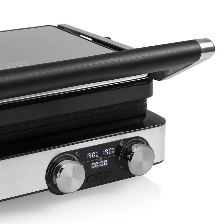 ¡Conviértase en un verdadero maestro de las barbacoas con la Princess 117310 Barbacoa digital Master Pro! Esta barbacoa semiprofesional cuenta con dos termostatos con los que puede operar las placas superior e inferior por separado. Use la parrilla como una sandwichera para hacer el sándwich perfecto o ábrala para usarla como parrilla de mesa, para asar carne y verduras al mismo tiempo. Las placas de la parrilla son extraíbles y se pueden introducir en el lavavajillas, de modo que su nueva barbacoa Master Pro es fácil de limpiar.