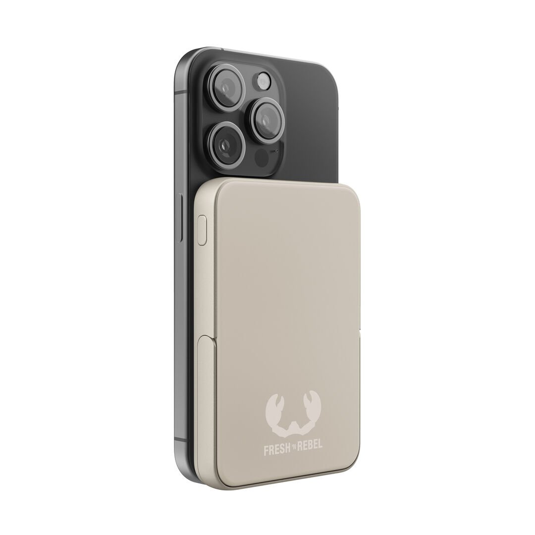 Carga tu iPhone de forma inal&aacute;mbrica y sin esfuerzo con la Powerbank Magn&eacute;tica. Su dise&ntilde;o ultrafino se adhiere magn&eacute;ticamente a tu iPhone (compatible con MagSafe), ofreciendo una carga segura y un soporte integrado para una visualizaci&oacute;n c&oacute;moda. &iexcl;Perfecta para llevar a cualquier lugar e incluso apta para volar!