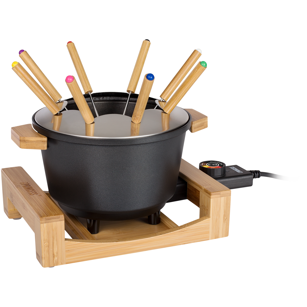 Esta fondue de último diseño tiene una carcasa con acabado en bambú. Con 1,5L de capacidad y 8 tenedores es ideal para carne, queso o chocolate. Tiene recubrimiento antiadherente para una limpieza más fácil + a raclette Pure 4 162950 de Princess. Después de su uso, las bandejas se pueden guardar de forma segura y sencilla para que no estorben. Gracias a su exquisito acabado en bambú, ¡esta raclette para 4 personas será la protagonista de la cocina! Esta fondue de último diseño tiene una carcasa con acabado en bambú. Con 1,5L de capacidad y 8 tenedores es ideal para carne, queso o chocolate. Tiene recubrimiento antiadherente para una limpieza más fácil + a raclette Pure 4 162950 de Princess. Después de su uso, las bandejas se pueden guardar de forma segura y sencilla para que no estorben. Gracias a su exquisito acabado en bambú, ¡esta raclette para 4 personas será la protagonista de la cocina!