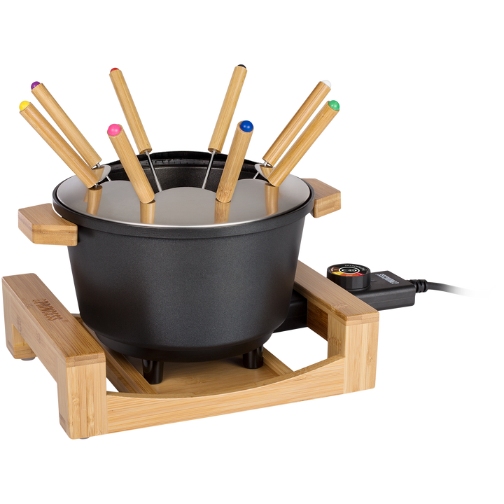 Esta fondue de último diseño tiene una carcasa con acabado en bambú. Con 1,5L de capacidad y 8 tenedores es ideal para carne, queso o chocolate. Tiene recubrimiento antiadherente para una limpieza más fácil + a raclette Pure 4 162950 de Princess. Después de su uso, las bandejas se pueden guardar de forma segura y sencilla para que no estorben. Gracias a su exquisito acabado en bambú, ¡esta raclette para 4 personas será la protagonista de la cocina! Esta fondue de último diseño tiene una carcasa con acabado en bambú. Con 1,5L de capacidad y 8 tenedores es ideal para carne, queso o chocolate. Tiene recubrimiento antiadherente para una limpieza más fácil + a raclette Pure 4 162950 de Princess. Después de su uso, las bandejas se pueden guardar de forma segura y sencilla para que no estorben. Gracias a su exquisito acabado en bambú, ¡esta raclette para 4 personas será la protagonista de la cocina!