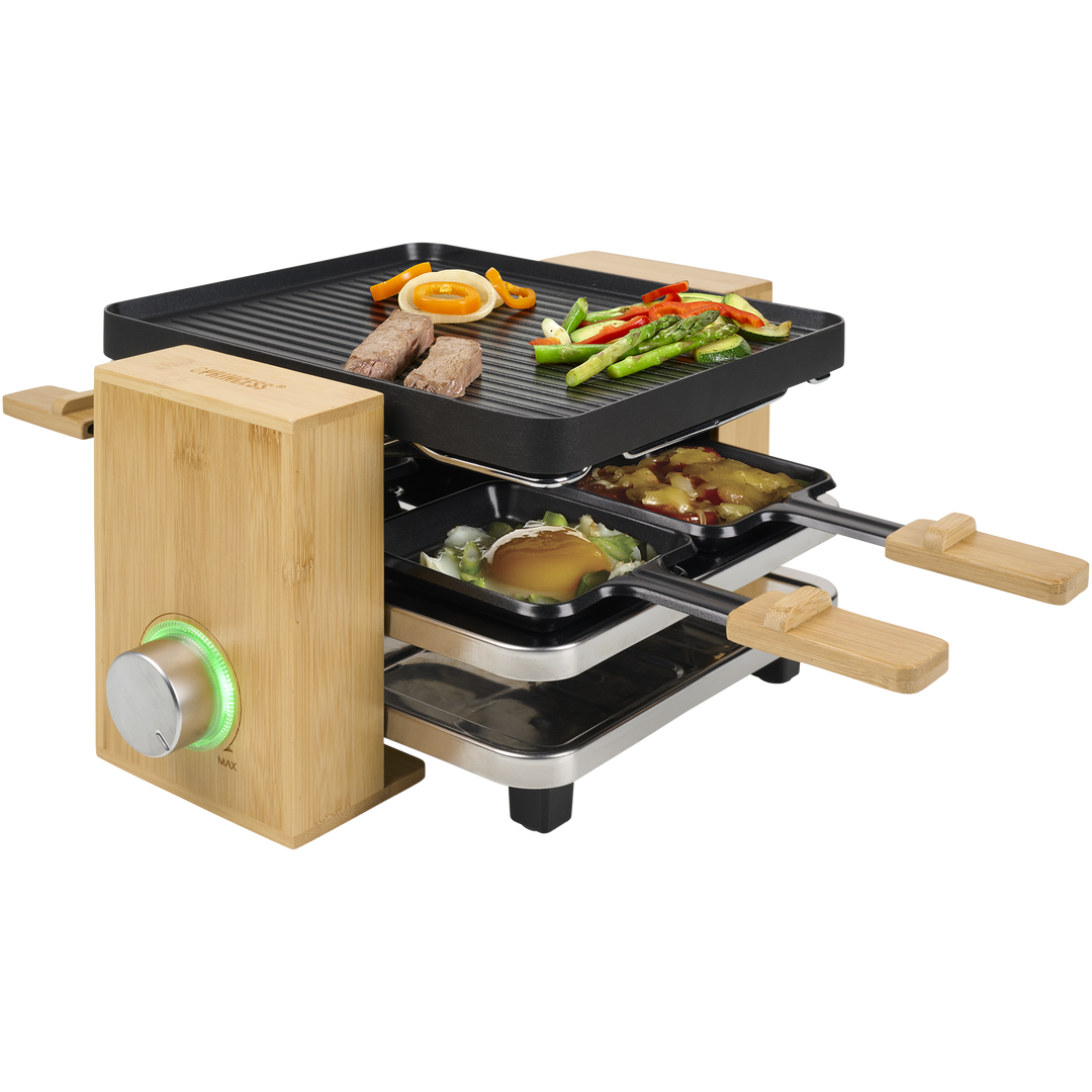 Esta fondue de último diseño tiene una carcasa con acabado en bambú. Con 1,5L de capacidad y 8 tenedores es ideal para carne, queso o chocolate. Tiene recubrimiento antiadherente para una limpieza más fácil + a raclette Pure 4 162950 de Princess. Después de su uso, las bandejas se pueden guardar de forma segura y sencilla para que no estorben. Gracias a su exquisito acabado en bambú, ¡esta raclette para 4 personas será la protagonista de la cocina! Esta fondue de último diseño tiene una carcasa con acabado en bambú. Con 1,5L de capacidad y 8 tenedores es ideal para carne, queso o chocolate. Tiene recubrimiento antiadherente para una limpieza más fácil + a raclette Pure 4 162950 de Princess. Después de su uso, las bandejas se pueden guardar de forma segura y sencilla para que no estorben. Gracias a su exquisito acabado en bambú, ¡esta raclette para 4 personas será la protagonista de la cocina!