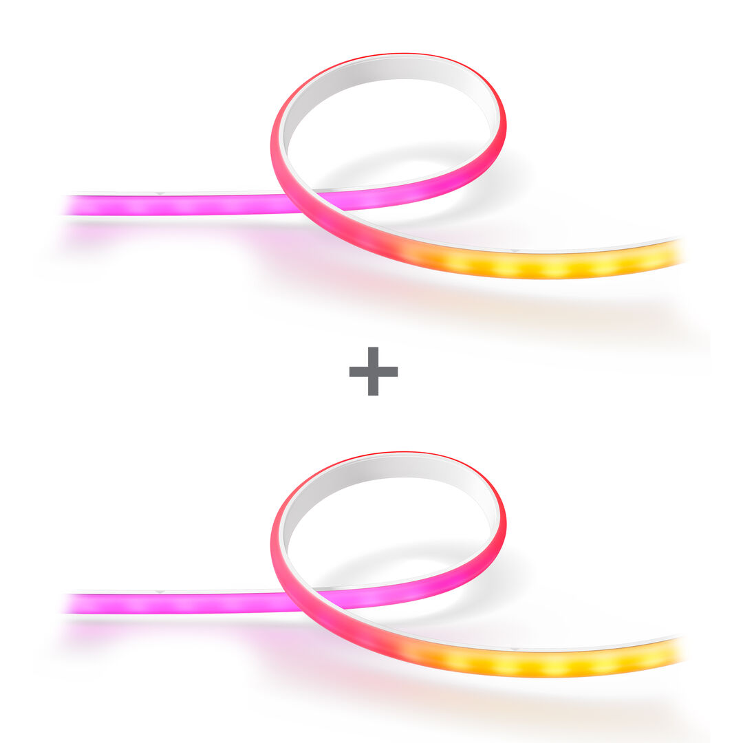 El pack incluye una tira de luces Philips Hue Gradient de 2 metros, perfecta para resaltar tu televisor, una estantería o cualquier mueble. Esta tira LED de vanguardia es capaz de proyectar múltiples colores a la vez, creando un efecto de degradado de color suave y dinámico que hará que tu espacio cobre vida.

Además, se incluye el Philips Hue Bridge, el cerebro del sistema. Con él, podrás controlar hasta 50 luces desde tu teléfono, sincronizarlas con tus películas y música, y crear rutinas personalizadas. Es el dúo perfecto para una experiencia de iluminación inteligente completa y envolvente.