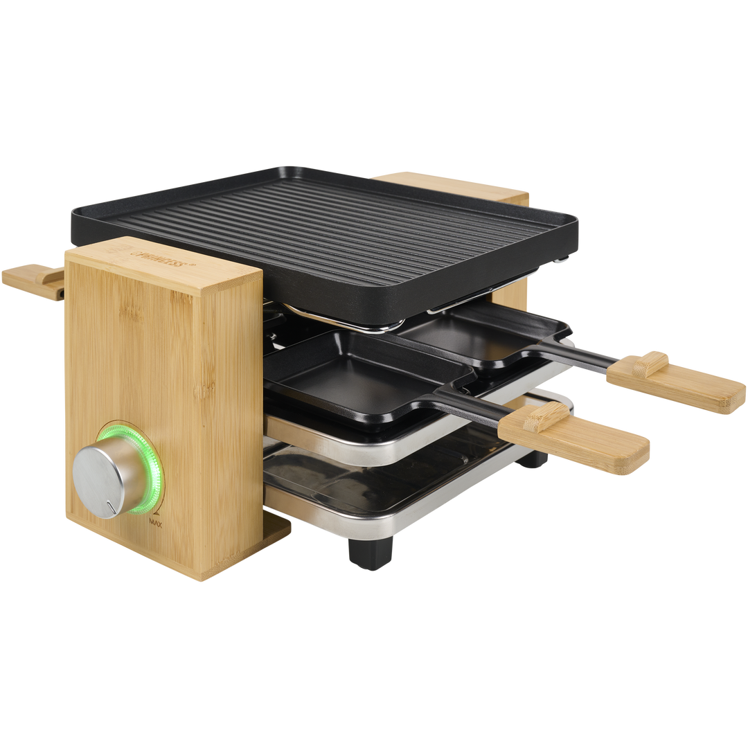 Esta fondue de último diseño tiene una carcasa con acabado en bambú. Con 1,5L de capacidad y 8 tenedores es ideal para carne, queso o chocolate. Tiene recubrimiento antiadherente para una limpieza más fácil + a raclette Pure 4 162950 de Princess. Después de su uso, las bandejas se pueden guardar de forma segura y sencilla para que no estorben. Gracias a su exquisito acabado en bambú, ¡esta raclette para 4 personas será la protagonista de la cocina! Esta fondue de último diseño tiene una carcasa con acabado en bambú. Con 1,5L de capacidad y 8 tenedores es ideal para carne, queso o chocolate. Tiene recubrimiento antiadherente para una limpieza más fácil + a raclette Pure 4 162950 de Princess. Después de su uso, las bandejas se pueden guardar de forma segura y sencilla para que no estorben. Gracias a su exquisito acabado en bambú, ¡esta raclette para 4 personas será la protagonista de la cocina!